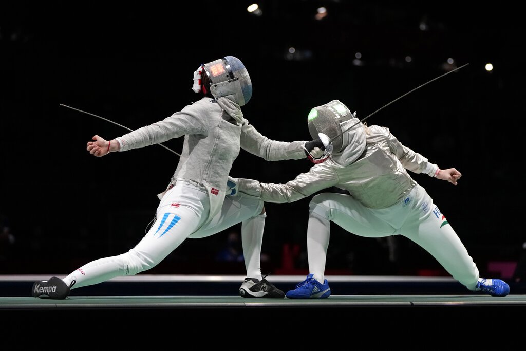 Olympic fencing loss parried by love and marriage proposal