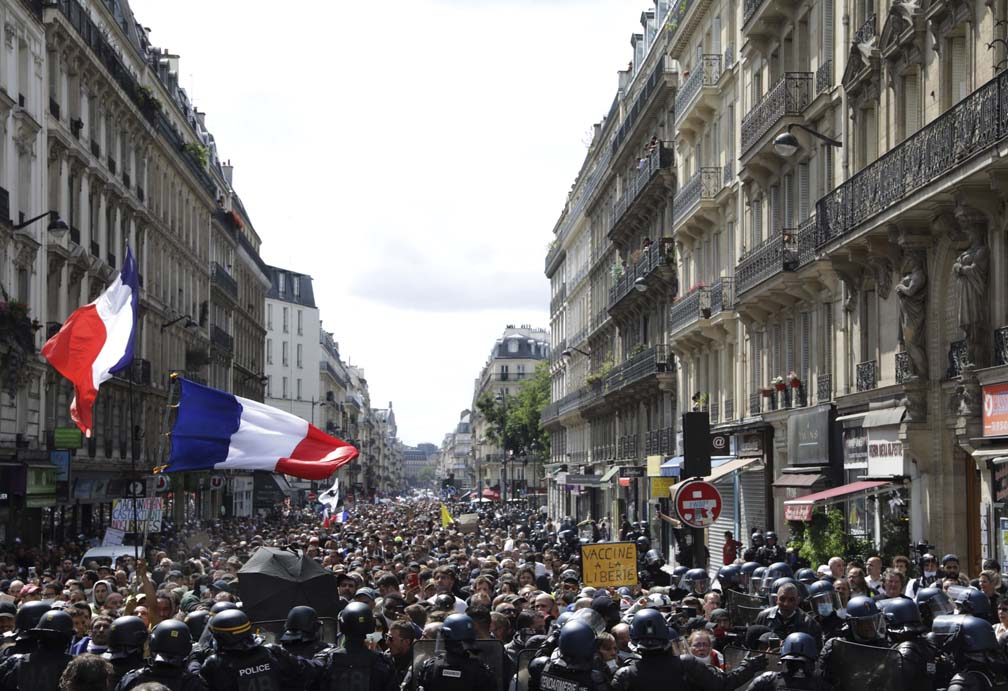 French police clash with anti-virus pass protesters in Paris