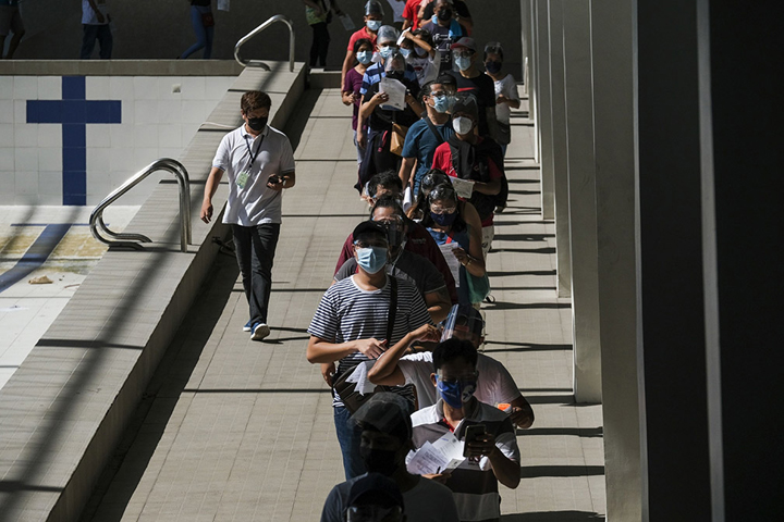 Rich Asians jump booster shot queue amid vaccine shortages