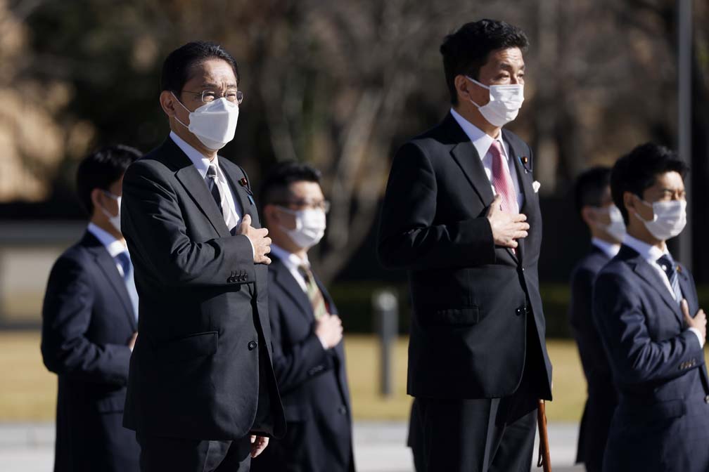 Japan PM vows to step up defense amid China, North Korea threats