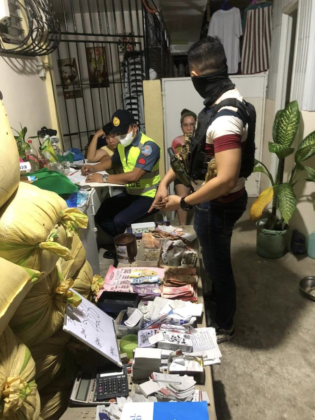 oct. 20 DXKS news-Simultaneous Police Entrapment Operation for unauthorized Illegal Numbers Games Netted three (3) suspects and