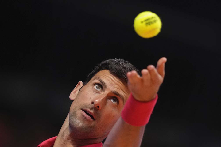 Djoko back Down Under a year after deportation
