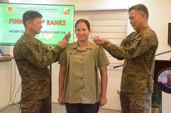 pinning of new rank insignia to 2nd Lt. Jurado